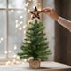Kerstboom met gepersonaliseerde houten piek ster