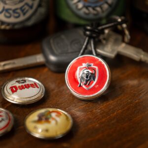 Duvel sleutelhanger met verwisselbare drukknop